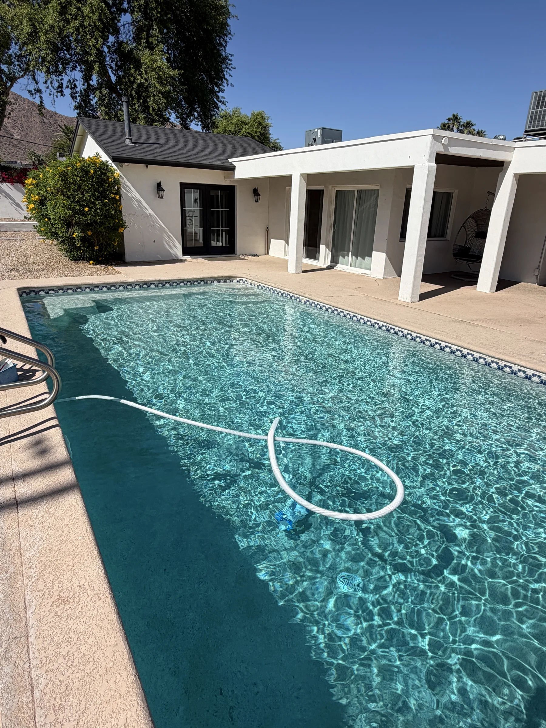 Weekly pool service in the East Valley with clean blue pool water